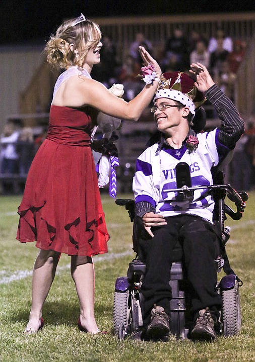 &lt;p&gt;Charlo seniors Jaycee Andersen and Dominic Shively high five after winning king and queen during halftime of the homecoming football game.&lt;/p&gt;