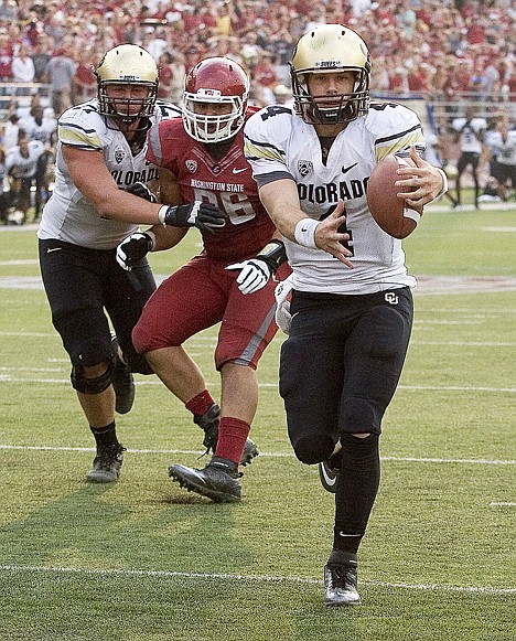 &lt;p&gt;Colorado quarterback Jordan Webb (4) crosses the goal line to score the game-winning touchdown with 12 seconds left as right tackle Stephane Nembot, left, blocks Washington State defensive lineman Xavier Cooper (96) on Saturday at Martin Stadium in Pullman.&lt;/p&gt;