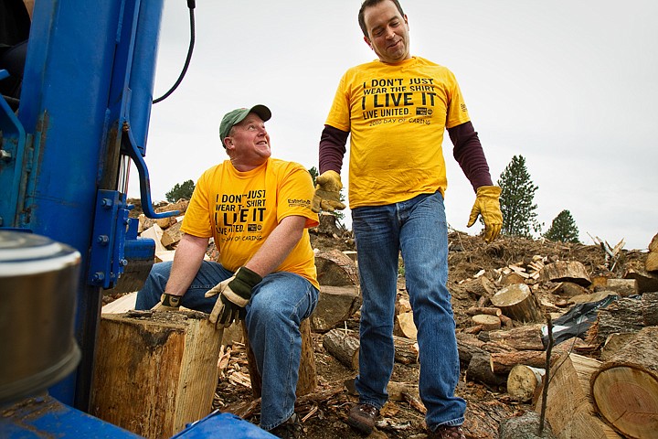 &lt;p&gt;Esterline Advanced Input Systems employees Chris Weber, left, and Dan Dunne share a laugh Thursday while volunteering their time to split wood for ElderHelp at Grace Trees and Forestry in Hayden. Dozens of volunteers partnered with the United Way to participate in Day of Caring events around the area. Grace Tree Service has donated well over 100 cord of fire wood to ElderHelp over the last two years.&lt;/p&gt;