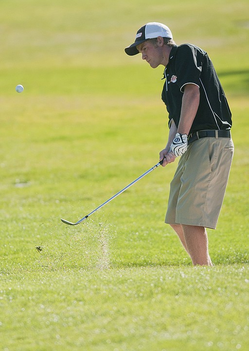 &lt;p&gt;Flathead's Michael Lavin chips onto the first green during the
second round of the Glacier/Whitefish/Flathead Invitational golf
tournament at Buffalo Hill Golf Club Saturday morning.&lt;/p&gt;