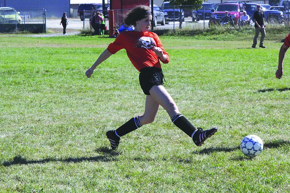 &lt;p&gt;Anna Dryden hits home the equalizer during Saturday's match against St. Regis. The game ended in a 1-1 draw.&lt;/p&gt;