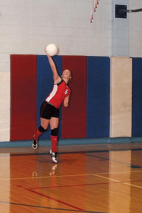 Nick Ianniello/Mineral Independent Hot Springs Lady Savage Heat member junior Devon White serves the ball Thursday night against the Superior Lady Bobcats. The Lady Savage Heat defeated the Lady Bobcats, 3-0 in three substantial victories, 25-14, 25-15 and 25-13.