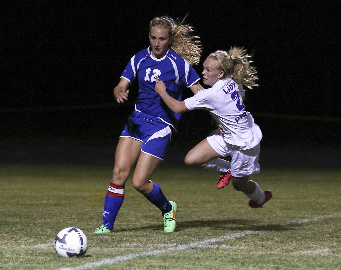 &lt;p&gt;Polson's Tiara Duford tries to steal the ball from a Columbia Falls player on Tuesday evening.&lt;/p&gt;