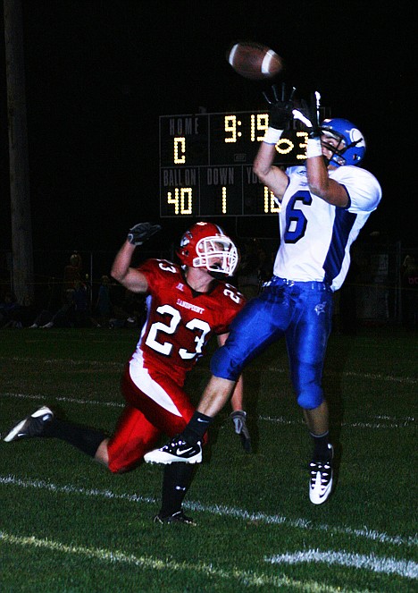 &lt;p&gt;Coeur d'Alene High's Bubba Duran (5) catches one of his three first-half touchdown passes in the Vikings' 88-12 nonleague win at Sandpoint on Friday.&lt;/p&gt;