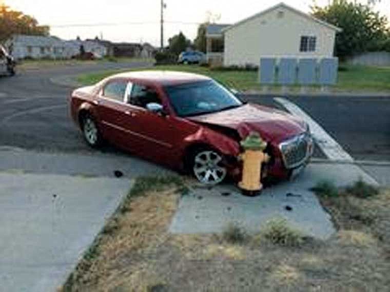 Brittany Strong, 18, of Moses Lake, was driving the pictured Chrysler 300. She was arrested after allegedly stealing the vehicle.