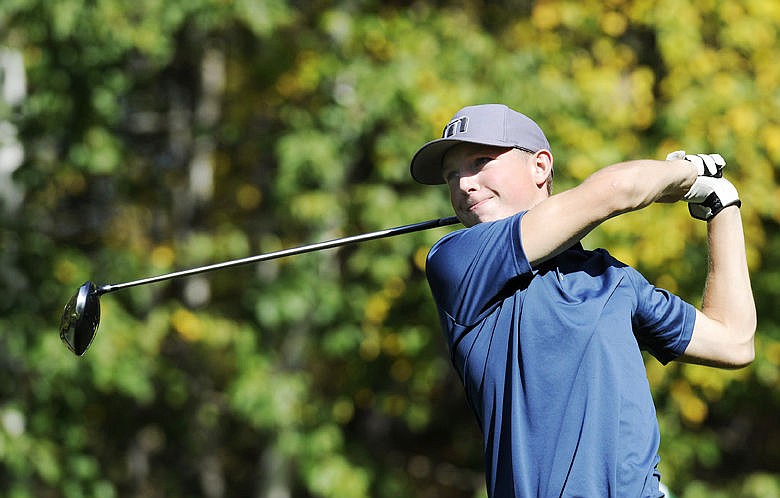 <p>Libby's Jonny Cielak tees off on the seventh hole at the Meadow Lake Golf Course during the 2014 Northwestern A Divisional Golf Tournament in this file photo.</p>