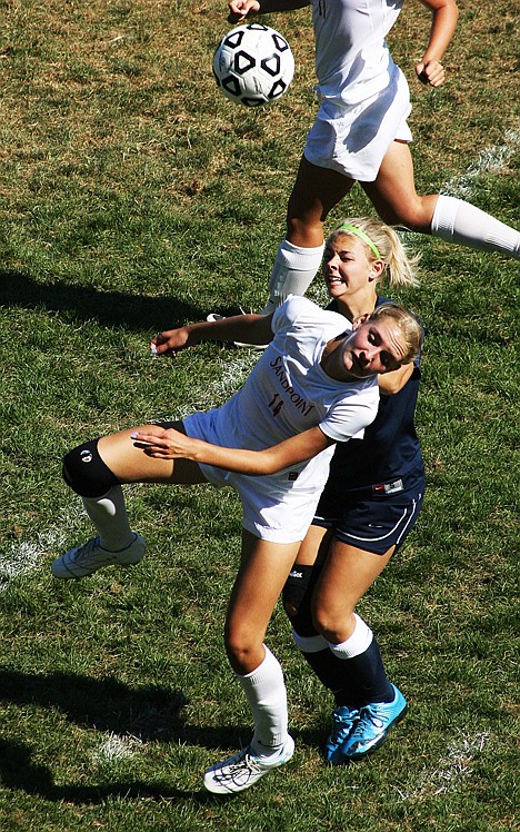 &lt;p&gt;Sandpoint's Jennie Meulenberg, front, and Lake City's Alyssa Allen battle for a header in the Timberwolves' 2-1 win on Saturday at Memorial Field in Sandpoint.&lt;/p&gt;