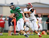 AA football: Wolfpack burns Hellgate, 77-8