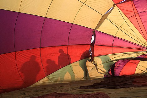 &lt;p&gt;Balloonists ready a balloon for flight just after dawn Friday in Prosser. The dawn flight is part of the annual Prosser Balloon Rally.&lt;/p&gt;