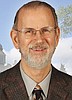 Incumbent wants to rein in government
