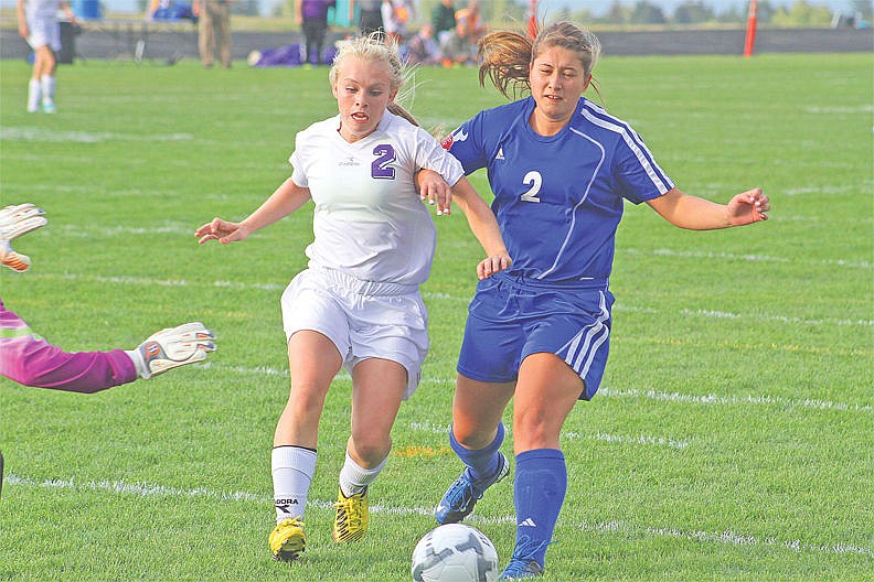 &lt;p&gt;Pirates Tiara Duford (2) and Valkyries Alyssa Beach-Wallen (2) race to get control of the ball during the second half of the varsity teams game at Pirates Sports Complex Thursday, Sept. 18, 2014, in Polson, Montana. Pirates fell to Bigfork 2-1.&lt;/p&gt;