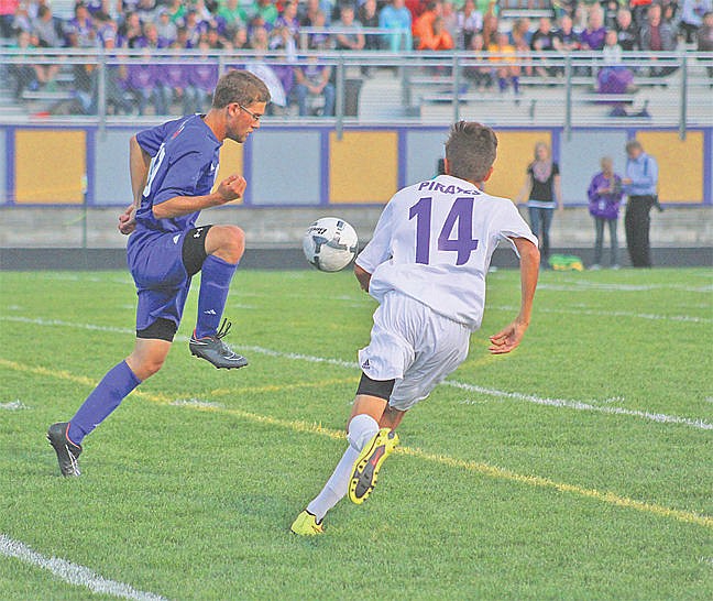 &lt;p&gt;Vikings Kegan Driver (10) attemps to gain control of the ball while Pirates Andrew Hanson (14) gives chase during the first half of the varsity teams game at Pirates Sports Complex Thursday, Sept. 18, 2014, in Polson, Montana. Vikings defeated Polson 2-0.&lt;/p&gt;