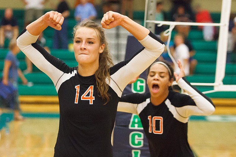 &lt;p&gt;Flathead's Cassie Krueger (14) and Makayla Moore (10) celebrate Saturday afternoon after Flathead's crosstown victory over the Wolfpack at Glacier High School.&#160;&lt;/p&gt;