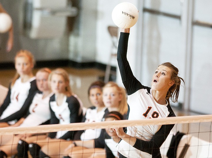 &lt;p&gt;Cassie Krueger spikes the ball during the first set of
Flathead's victory over Hellgate Tuesday evening.&lt;/p&gt;