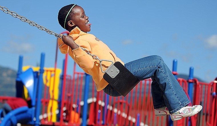 &lt;p&gt;Alice, one of the 17 members of the African Children&#146;s Choir,
enjoys swinging at the Whitefish Church of the Nazarene playground
Tuesday afternoon. The choir will perform a free concert tonight at
Christ Lutheran Church in Whitefish.&lt;/p&gt;