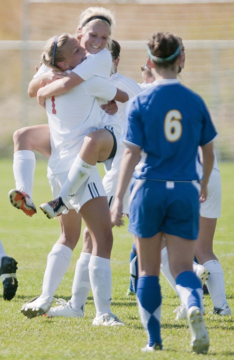 &lt;p&gt;Paige Birky celebrates with Joey Thiel (1) after Flathead's
first goal during Saturday's Western AA soccer match with the
Missoula BIg Sky Eagles at Kidsports complex.&lt;/p&gt;