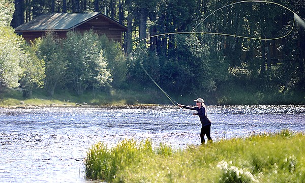 &lt;p&gt;Pam Richmond of Edenton, N.C., learns to fly fish on Friday
afternoon along the lower Swan River east of Bigfork. Richmond, who
just turned fifty, said fly fishing had been on her bugket list.
So, on this visit to Montana, she and her husband and friends
purchased a fishing license and went out to watch as she learned.
Acccording to Richard Dixon, the family friend who helped teach her
they didn't catch any fish, but the goal of the day was more the
learning process. He said she looked like she had been casting much
longer than one would expect from a first-timer.&lt;/p&gt;