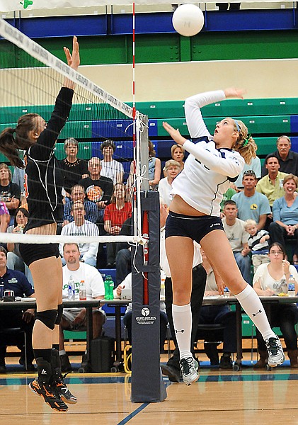 &lt;p&gt;Glacier sophomore Hannah Atlee, 28, goes up the net against
Flathead junior Cassie Krueger, 19, during game one of their match
up on Thursday night at Glacier.&lt;/p&gt;