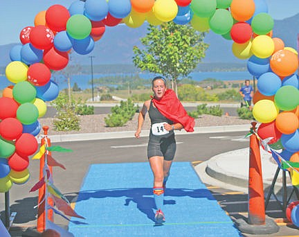 &lt;p&gt;Malia Seeley (14) of Polson had a super time of 23.01 in the 5K. Her time placed her first in the 5K section of the Misssion Valley Kids Walk / Run, Sunday, September 21, 2014&lt;/p&gt;