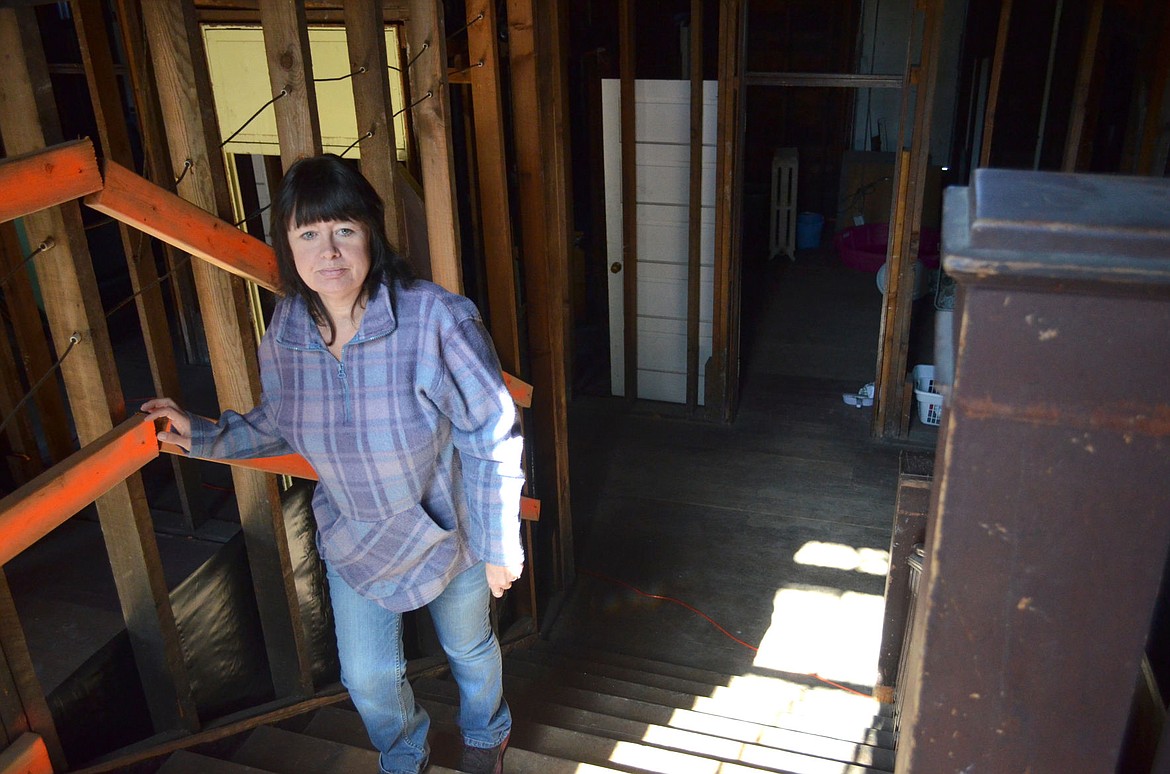 &lt;p&gt;Hotel owner Gail Burger climbs the stairs to the third story of Hotel Libby. Renovations inside the hotel have been underway for years as Burger works to restore the building to its 1930s form. (Seaborn Larson/The Western News)&lt;/p&gt;