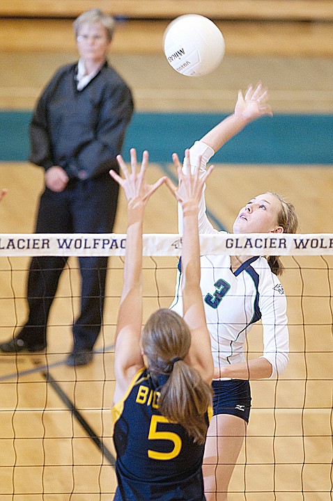 &lt;p&gt;Glacier's Lexy Boschee (3) spikes the ball past an Eagles
defender during the Wolf Pack's victory over Big Sky on Tuesday
night.&lt;/p&gt;