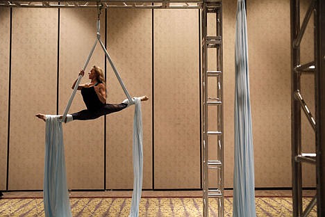 &lt;p&gt;Nicole Landkas, a fifth generation circus performer, teaches a class on arial silks at the Pole Expo in Las Vegas, Sept. 7.&lt;/p&gt;