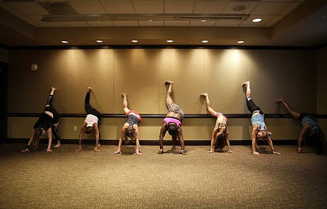 &lt;p&gt;Roz Mayes, center, teaches how to &quot;twerk&quot; during a workshop at the Pole Expo in Las Vegas, Sept. 7. Pole dancers from around the world gathered in Las Vegas this month to swap ideas and learn tricks of the trade.&lt;/p&gt;