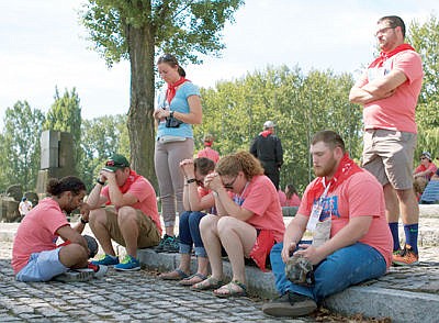 &lt;p&gt;Josh McGough (bottom right) of Libby with his small group praying near the ruins of the gas chambers at the Birkenau Concentration Camp.&lt;/p&gt;