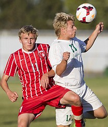<p>Lakeland High School boys battle Sandpoint High School, Wednesday, Sept. 28, 2016 in Rathdrum. The Hawks fought well but lost 3-1 to Sandpoint. To purchase photo, please visit www.cdapress.com/photos</p>