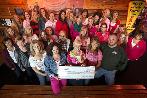 &lt;p&gt;The Chicks n' Chaps group presents a check to the Kootenai Health Foundation cancer patient support program Friday at Texas Roadhouse restaurant for over $6,600.&lt;/p&gt;