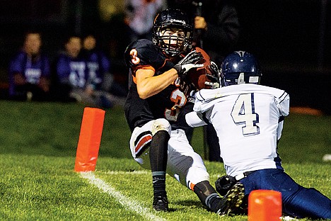 &lt;p&gt;Post Falls High School's Michael McKeown makes a reception for a touchdown in the fourth quarter.&lt;/p&gt;