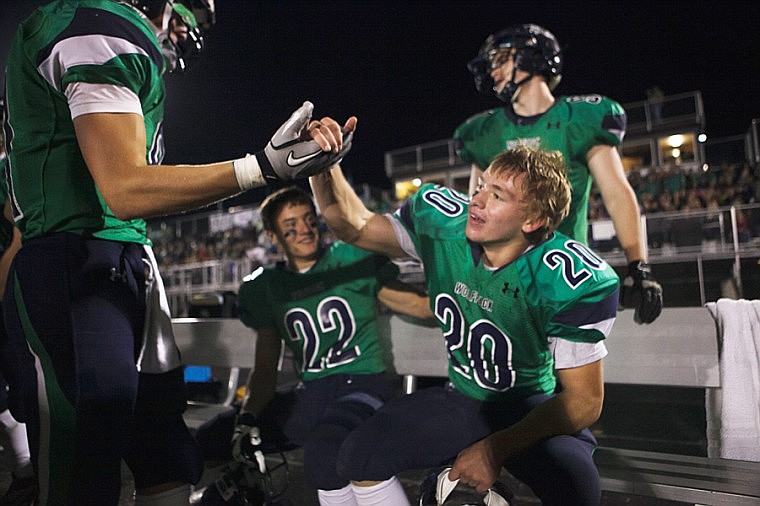 &lt;p&gt;Teammates congratulate Glacier sophomore Evan Epperly (20) after he took an interception back for a touchdown Friday night during the sixth crosstown matchup at Legends Stadium.&lt;/p&gt;