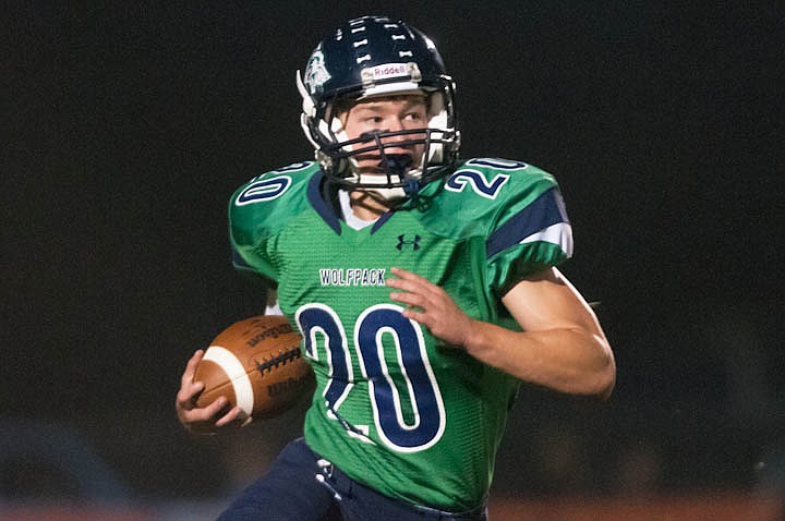 &lt;p&gt;Patrick Cote/Daily Inter Lake Evan Epperly (20) runs the ballFriday night during the sixth crosstown matchup at Legends Stadium. Friday, Sept. 28, 2012 in Kalispell, Montana.&lt;/p&gt;