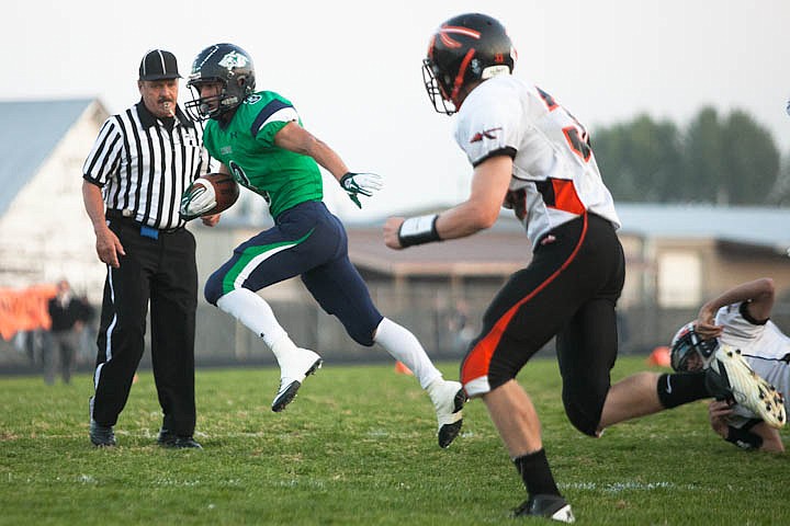 &lt;p&gt;Patrick Cote/Daily Inter Lake Glacier junior wide receiver Kyle Griffith (3) runs the ball Friday night during the sixth crosstown matchup at Legends Stadium. Friday, Sept. 28, 2012 in Kalispell, Montana.&lt;/p&gt;