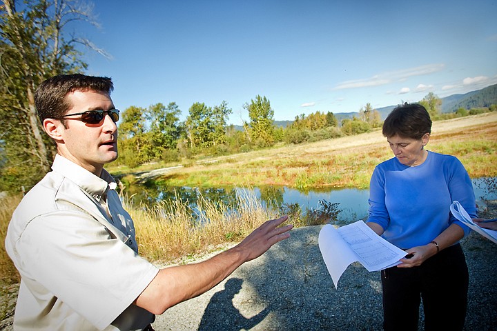 &lt;p&gt;Brian Spears, a resource contaminants specialists with the U.S. Fish and Wildlife Service, discusses the environmental improvements alongside Anne Dailey, an EPA environmental specialist, regarding the nearly 400 acres of wetlands during a tour Tuesday in the chain lakes area along Highway 3.&lt;/p&gt;