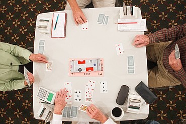 <p>Clockwise from top, Jaye Smith, Bob Maro, Marguerite Smith and Sarah Maro compete Wednesday afternoon during the Glacier Regional Bridge Tournament at the Hilton Garden Inn in Kalispell.</p>