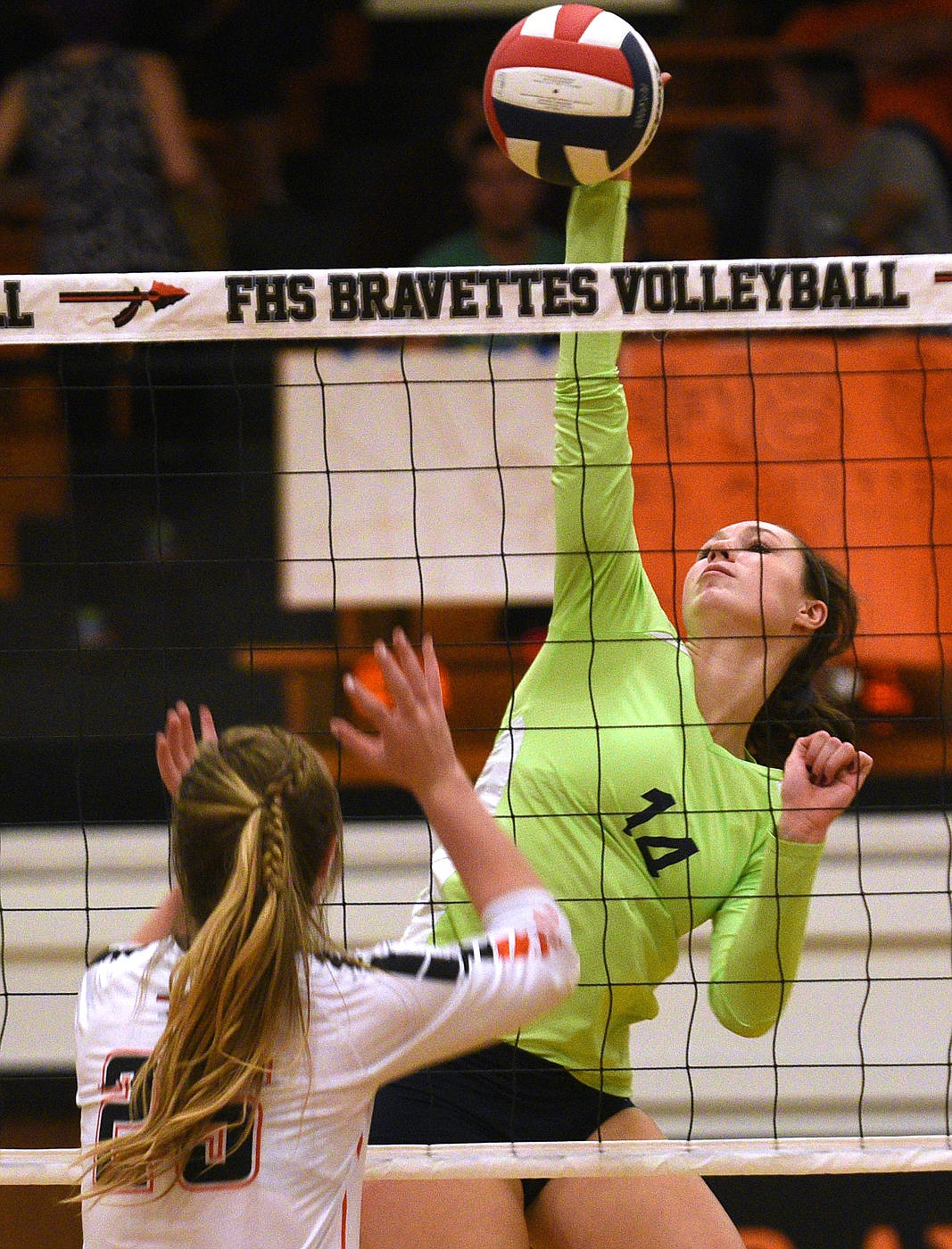 &lt;p&gt;Glacier hitter Abi Fiske goes for a kill during the first game against Flathead on Thursday. (Aaric Bryan/Daily Inter Lake)&lt;/p&gt;