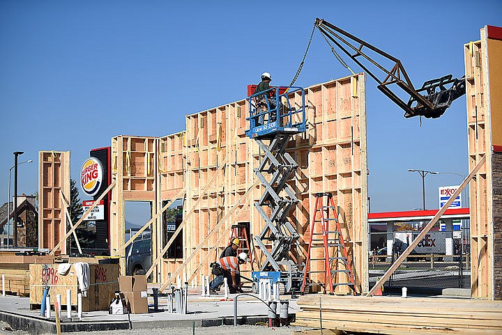 &lt;p&gt;Construction of the new Popeye's in Kalispell, on US 93 south of the courthouse, is underway on Tuesday morning, September 29. The walls of the building were delivered Monday night and according to owner Denny Rehberg the exterior of the building will be completed today. (Brenda Ahearn/Daily Inter Lake)&lt;/p&gt;