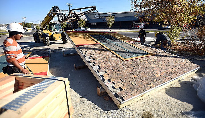 &lt;p&gt;Construction of the new Popeye's in Kalispell, on US 93 south of the courthouse, is underway on Tuesday morning, September 29. The walls of the building were delivered Monday night and according to owner Denny Rehberg the exterior of the building will be completed today.&#160;(Brenda Ahearn/Daily Inter Lake)&lt;/p&gt;