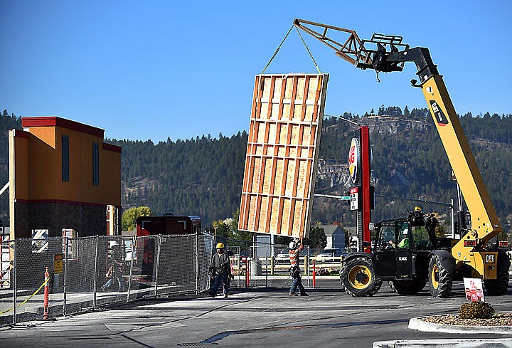 &lt;p&gt;Construction of the new Popeye's in Kalispell, on US 93 south of the courthouse, is underway on Tuesday morning, September 29. The walls of the building were delivered Monday night and according to owner Denny Rehberg the exterior of the building will be completed today.&#160;(Brenda Ahearn/Daily Inter Lake)&lt;/p&gt;