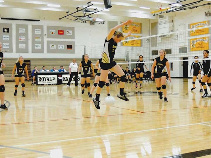 Seila Jenks of Royal skips over the sideline to let the ball go out of bounds for a Royal point during the Royal-Wahluke prep volleyball match last Thursday.