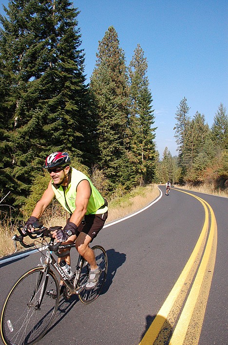 <p>Mitch Lile of Hayden pedals up the steep climb near Powderhorn Bay.</p>