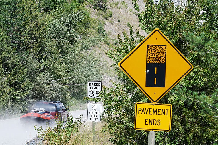 &lt;p&gt;Vehicles kick up dust as they drive down the North Fork Road Thursday up the North Fork of the Flathead River. Aug. 8, 2013 in North Fork, Montana. (Patrick Cote/Daily Inter Lake)&lt;/p&gt;