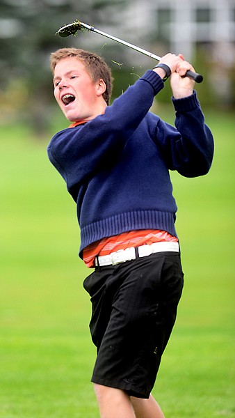 &lt;p&gt;Flathead sophomore Ryan Keenan reacts as he chips the ball onto the 18th green during the Flatfish Invitational at Village Greens on Friday.&lt;/p&gt;