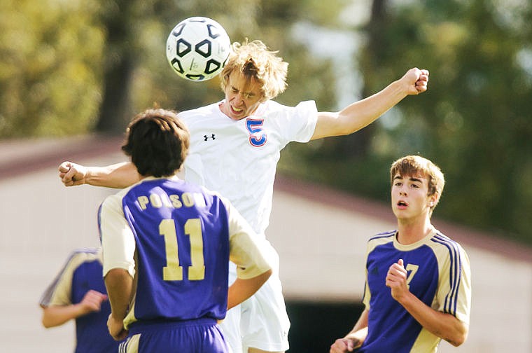 &lt;p&gt;Columbia Falls senior Caleb Baumann (5) goes up for a header Thursday afternoon during Columbia Falls' matchup against Polson at Flip Darling Field in Columbia Falls.&lt;/p&gt;