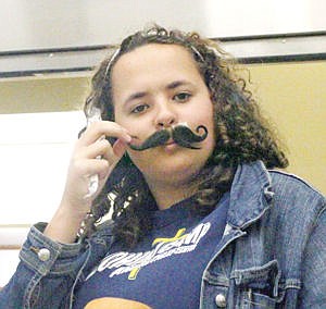 &lt;p&gt;Freshman Shannon Kyes shows off her homecoming mustache during lunch at Libby High School Monday.&lt;/p&gt;