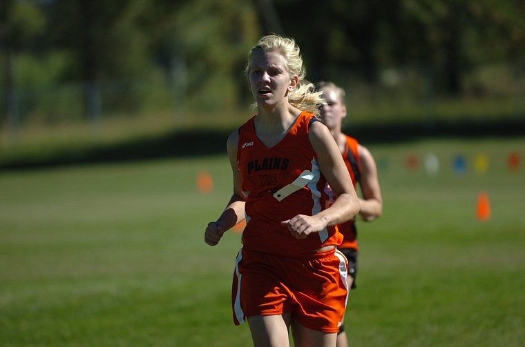 Freshman runner Andrea Wood bested he personal record by a minute at the Ronan meet.
