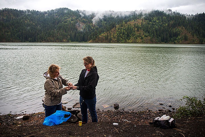 &lt;p&gt;TESS FREEMAN/Press&lt;/p&gt;&lt;p&gt;Kayla Verkist, right, helps Erin Bills tie a lure for her fishing line at Fernan Lake on Wednesday afternoon. &#147;She is teaching me how to fish and I&#146;m going to teach her how to snowboard,&#148; Bills said.&lt;/p&gt;