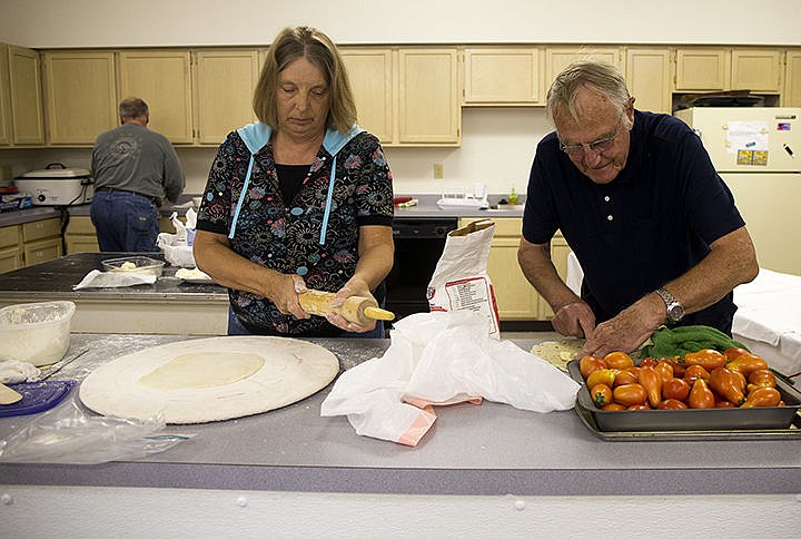 &lt;p&gt;TESS FREEMAN/Press&lt;/p&gt;&lt;p&gt;Carol Uptagarfft, left, and Asbjorn Rostad from the Sons of Norway club prepare lefse for the Norwegian Heritage Fair on Saturday Sept. 20 at 10 a.m. The event is open for the public and includes an authentic Norwegian lunch, Ebelskiver demo and a Rosettes demo.&lt;/p&gt;