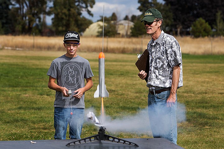 &lt;p&gt;TESS FREEMAN/Press&lt;/p&gt;&lt;p&gt;Nathen Jerome and his teacher Frank Hess watch Nathen&#146;s rocket launch during a physical science class on Friday afternoon. Students made handmade rockets out of toilet paper rolls and cardboard and then measured the height using trigonometry.&lt;/p&gt;